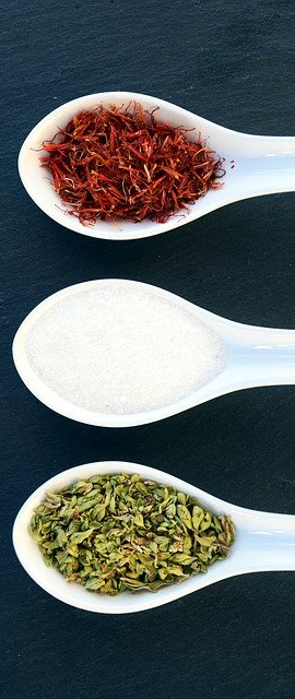 3 different spices on spoons