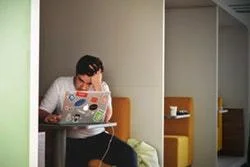 Stressed out person on their computer